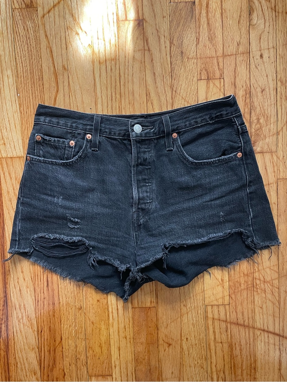 501 Levi’s Black Distressed Cut-Offs